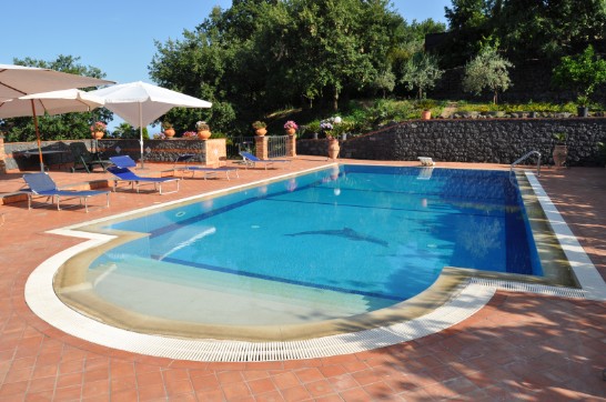 Entrance to the pool of Villa Del Sole holiday home close to Mount Etna